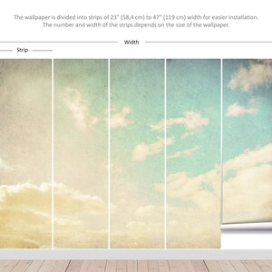May include: Wallpaper featuring a sky with clouds in shades of blue, yellow, and white. The wallpaper is divided into strips of 23" (58.4 cm) to 47" (119 cm) wide for easier installation. The number and width of the strips depends on the size of the wallpaper.