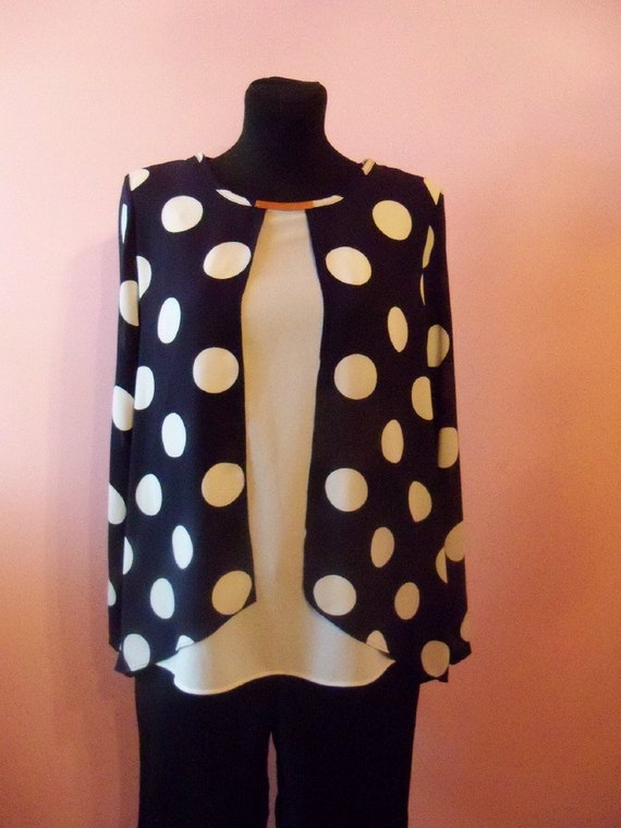 Blusa azul con puntos blancos sale