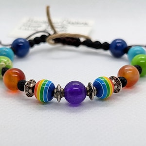 May include: A rustic wooden sign with the text "Welcome to our home" in white lettering. The sign features a distressed finish and a simple, inviting design, perfect for a front porch or entryway.