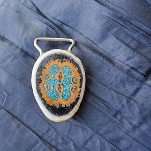 Elk antler belt buckle inlaid with black walnut shell turquoise chips black tourmaline chips