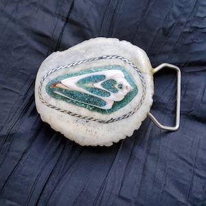 Moose antler belt buckle with seashell inlay