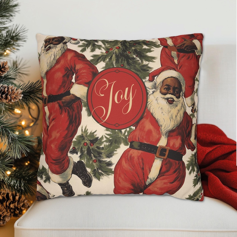 Brighten up your holiday decor with this wonderful African American Santa Claus 'Joy' throw pillow featuring happy Santas &  pine detail. Choose whether to have a pillow insert - our covers are printed upon order in the US with outdoor options.