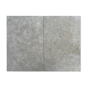 May include: Two square tiles made of a light grey stone with a speckled texture.