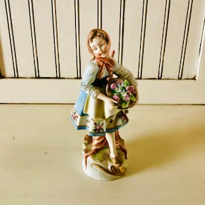 Porcelain Bisque Figurine Young Girl Selling Flowers