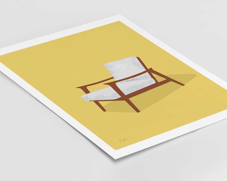 May include: An illustration of a mid-century modern chair. The chair has a brown wooden frame and white cushions, set against a yellow background. The artwork is printed on a white paper.