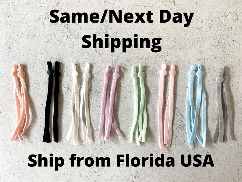 May include: Assortment of 10 pairs of elastic mask strap extenders in various colors, including pink, black, white, lavender, light green, light pink, light blue, and gray.  The extenders are made of soft, stretchy fabric and have adjustable plastic sliders.  "Same/Next Day Shipping" and "Ship from Florida USA" are written in black text at the top and bottom of the image.