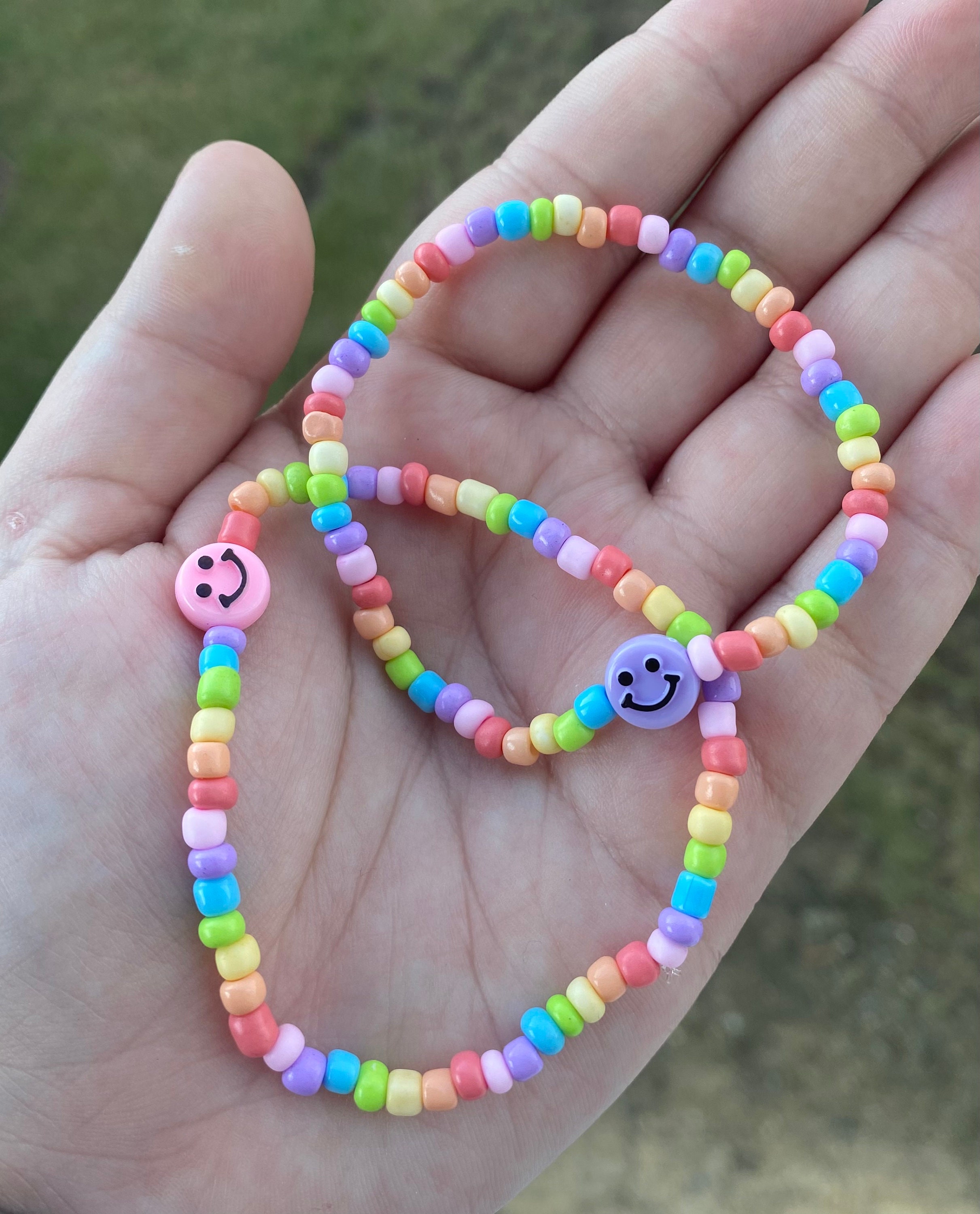 Claire's Best Friends Color-Changing UV Happy Face Beads Bracelets - 2 Pack | Rainbow