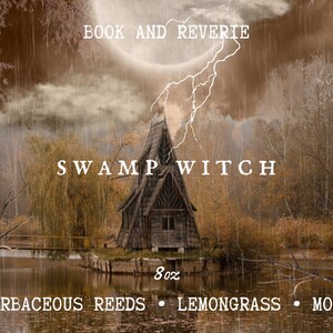 May include: An atmospheric image featuring a rustic wooden cabin on a small island in a swamp. The text "SWAMP WITCH" is displayed, along with "8oz" and scent notes: "HERBACEOUS REEDS &bull; LEMONGRASS &bull; MOSS". The sky shows a lightning strike.