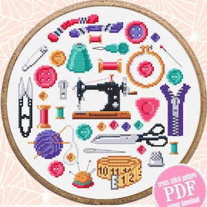 May include: A cross-stitch design depicting various sewing items such as a sewing machine, scissors, spools of thread, buttons, and a measuring tape. The design is framed in a wooden embroidery hoop, with the text "Author Embroide Design".