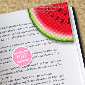 May include: A pink and white digital download button with the text "cross stitch pattern PDF instant download" on a book page with a red and green watermelon bookmark.