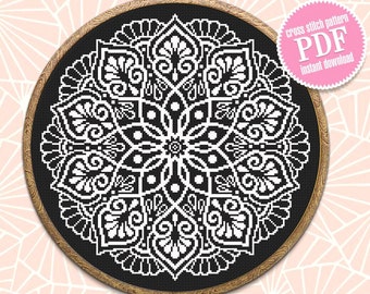 May include: Black and white cross stitch pattern of a mandala design in a wooden embroidery hoop. The pattern is available as a PDF instant download.