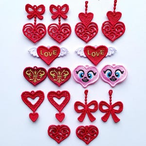 May include: A collection of red embroidered patches in various heart and bow shapes. Some patches feature the word "LOVE" with wings, while others have decorative gold accents or cute faces. The text "Author Embroide Design" is at the top.