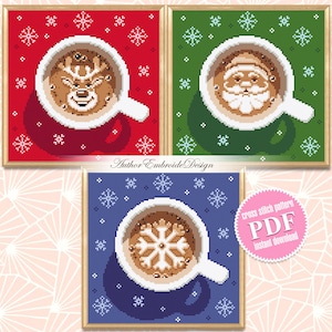 May include: Three framed cross-stitch patterns featuring coffee cup designs with holiday themes. One cup has a reindeer, another Santa Claus, and the last a snowflake. Each cup is set against a colored background with snowflakes. The text "Author Embroide Design" is visible.