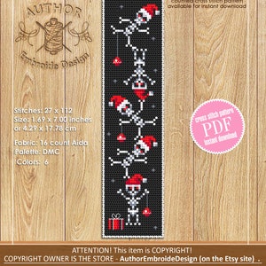 May include: A counted cross stitch pattern featuring a black background with five skeletons wearing Santa hats and holding ornaments. The pattern is 1.69 inches by 7 inches or 4.29 cm by 17.78 cm. The pattern is available for instant download as a PDF.