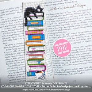 May include: A black cat sitting on a stack of colorful books with a cup of coffee next to it. The image is a cross stitch pattern for a bookmark. The text "cross stitch pattern PDF instant download" is on a pink circle.