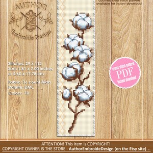 May include: A counted cross stitch pattern of a cotton plant with white blossoms and brown stems on a beige background. The pattern is available for instant download as a PDF file. The design is 1.81 inches by 7 inches or 4.60 cm by 17.78 cm and uses 10 colours of DMC floss.