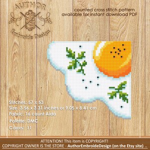 May include: Counted cross stitch pattern of a fried egg with parsley, available for instant download as a PDF. The pattern is 57 stitches wide by 53 stitches high, and measures 3.56 inches by 3.31 inches. The pattern uses 16 count Aida fabric and DMC floss in 11 colors.
