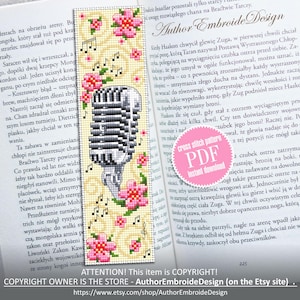 May include: A cross stitch bookmark featuring a vintage microphone with floral accents and musical notes. The bookmark is on a book page with text in Polish. The text on the bookmark reads "Author Embroide Design" and "Cross Stitch Pattern PDF Instant Download".