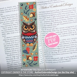 May include: A cross stitch pattern featuring a blue and red owl with a red scarf, surrounded by leaves, acorns, and flowers. The pattern is on a teal background and is labelled "PDF Instant Download". The text "Author Embroide Design" is visible in the top right corner of the image.