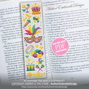 May include: Cross-stitch bookmark featuring a Mardi Gras theme. The design includes a crown, mask, beads, and musical instruments in purple, green, yellow, and gold. The bookmark is displayed on an open book.