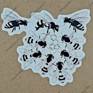 May include: A white sticker with a black and white illustration of a honeycomb with eight bees surrounding it. The bees are in a circular pattern around the honeycomb.