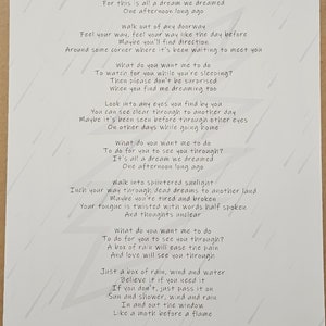 May include: A white background with black text, a poem titled "Box of Rain" by the Grateful Dead. The poem is about rain and how it can be a symbol of hope and renewal. The poem is written in a conversational style and is full of imagery.