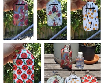 Sanitizer pouch- Sunscreen pouch- Lipstick pouch- Australian flowers- Neopren- Clip to your bag- Practical- Great gift.