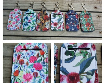 Sanitizer pouch- Sunscreen pouch- Lipstick pouch- Australian flowers- Neopren- Clip to your bag- Practical- Great gift.