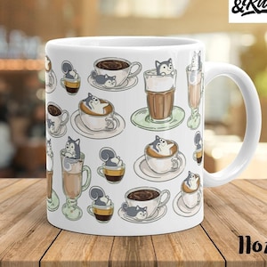May include: White ceramic mug featuring a pattern of cartoon dogs and squirrels enjoying coffee and espresso. The mug has a black handle and says "Bark & Run" on the side. The mug is 11 oz.