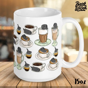 May include: White ceramic coffee mug with a black and white illustration of dogs in coffee cups. The mug has a black handle and the text "Bark & Run" is printed on the top right corner. The mug is 15 oz.