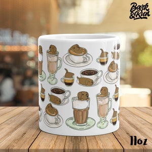 May include: White ceramic mug with a repeating pattern of brown dogs in coffee cups and glasses. The text "Bark & Run" is printed on the mug.