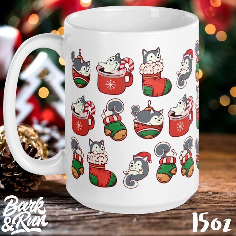 May include: White ceramic mug with a Christmas-themed design featuring a repeating pattern of cartoon huskies in various holiday activities, including wearing Santa hats, holding candy canes, and sitting in Christmas stockings. The mug has a 15oz capacity.