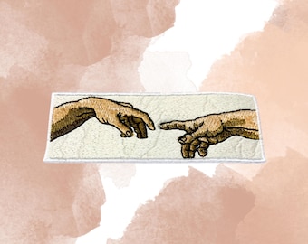 May include: Embroidered patch featuring a recreation of Michelangelo's The Creation of Adam, depicting two hands reaching towards each other.