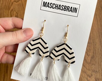 Stainless steel hanging earrings with zigzag pattern and tassel pendants
