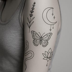 May include: Black line art tattoos on an arm. Designs include a lavender sprig, a crescent moon with hanging stars, a butterfly, a snake, and a lotus flower with a water droplet.