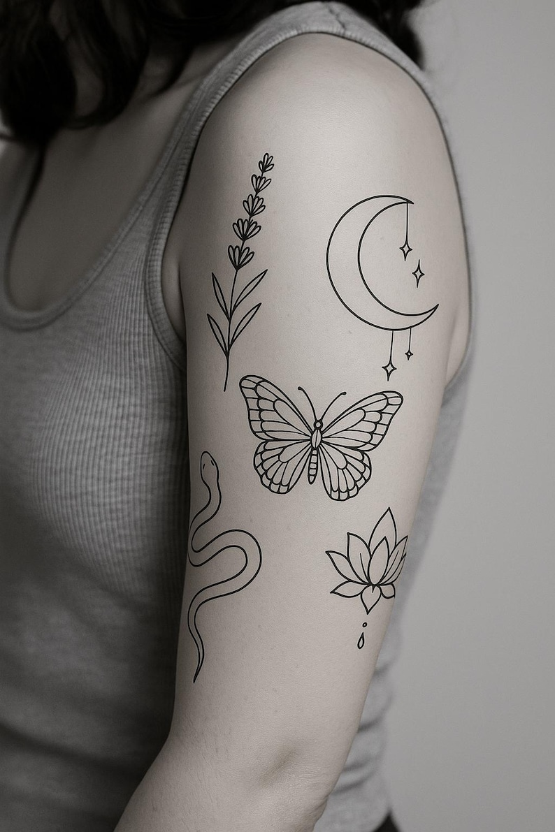 May include: Black line art tattoos on an arm. Designs include a lavender sprig, a crescent moon with hanging stars, a butterfly, a snake, and a lotus flower with a water droplet.