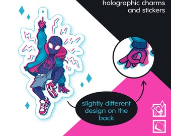May include: Holographic charm or sticker featuring a Spider-Man character from Spiderverse. The character is in a dynamic pose, wearing a blue jacket, red hoodie, and black mask. The image includes the text "Spiderverse" and "holographic charms and stickers."
