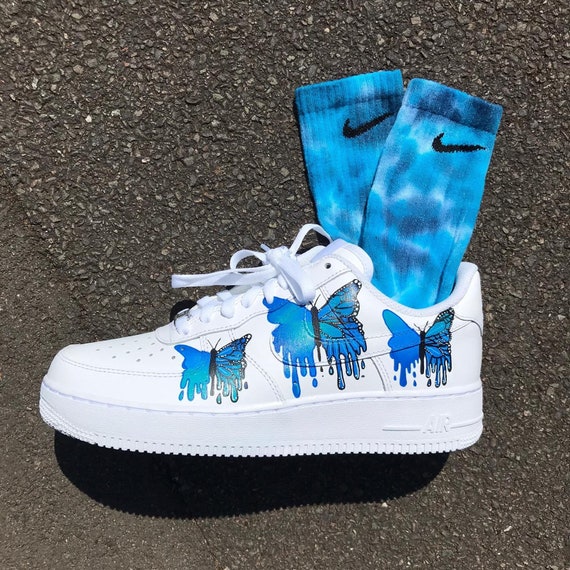 nike air forces with blue butterflies