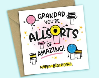 May include: A birthday card with the message "Grandad you're all sorts of amazing!" in black text. The card features cartoon characters and the words "Happy Birthday!!" in yellow. The card is on a brown envelope.