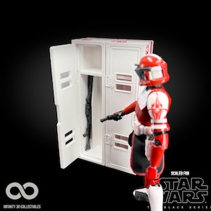 May include: A red and white action figure of a Star Wars character stands next to a white locker with a black rifle inside. The figure is holding a black weapon. The words "SCALED FOR STAR WARS BLACK SERIES" are visible.