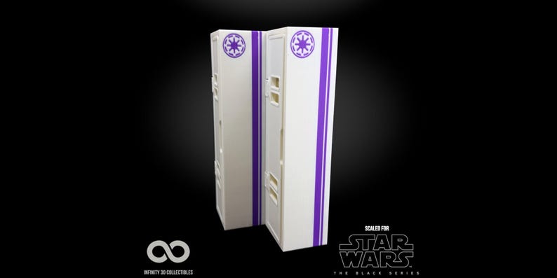 May include: Two white rectangular display cases with purple accents and Imperial symbols. The cases are designed for Star Wars The Black Series figures. The cases have the text "SCALED FOR STAR WARS THE BLACK SERIES".