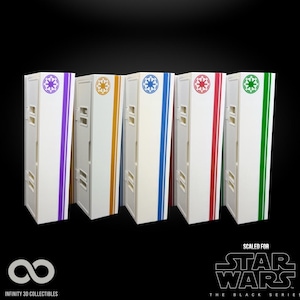 May include: Five white storage boxes with colored stripes and symbols, including purple, gold, blue, red, and green. Each box has a Star Wars logo and the text "Scaled for Star Wars The Black Series".