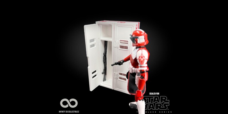 May include: A red and white action figure of a Star Wars character stands next to a white locker with a black rifle inside. The figure is holding a black weapon. The words "SCALED FOR STAR WARS BLACK SERIES" are visible.