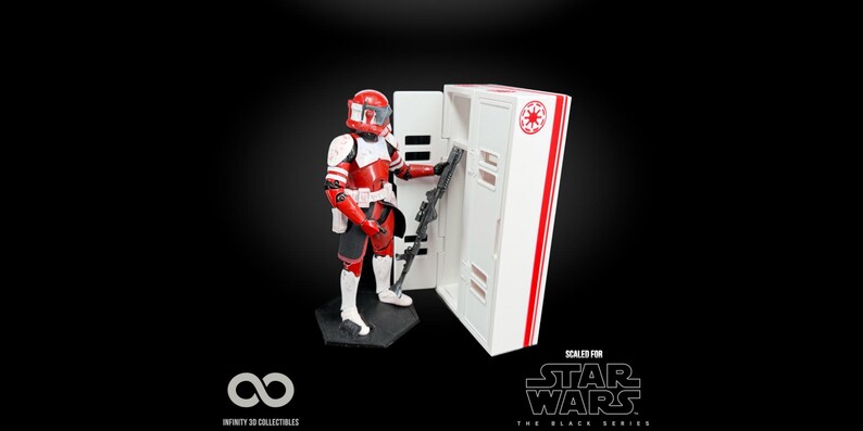 May include: A Star Wars action figure of a red and white armored character with a blaster, standing next to a white storage unit with red accents. The figure is on a black base. The words "SCALED FOR STAR WARS THE BLACK SERIES" are visible.