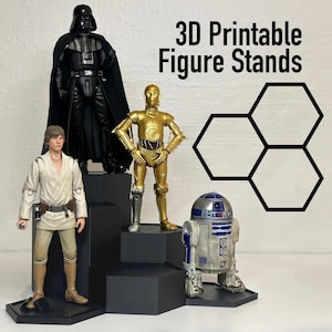 May include: 3D Printable Figure Stands, a set of black hexagonal display stands with a Star Wars theme. The stands are arranged in a tiered formation, showcasing action figures of Darth Vader, Luke Skywalker, C-3PO, and R2-D2.