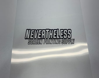 May include: A clear plastic sheet with the text "NEVERTHELESS SCREEN PRINTING SUPPLY" printed in black.