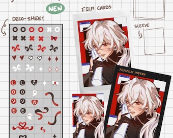 May include: DIY Valentine's Day set with a deco sheet featuring hearts, bows, stars, and letters, two photo cards with a black and white illustration of a person with white hair, and a Fujifilm Instax camera with the text "INSTAX 1 ISO 800".