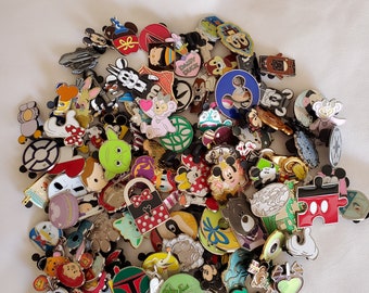 NEW Disney Trading Pins 25 lot. Up to 500 unique pins with no doubles.  We have hidden mickey, princesses, star wars, classic characters