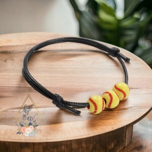 Bracciale regolabile per softball