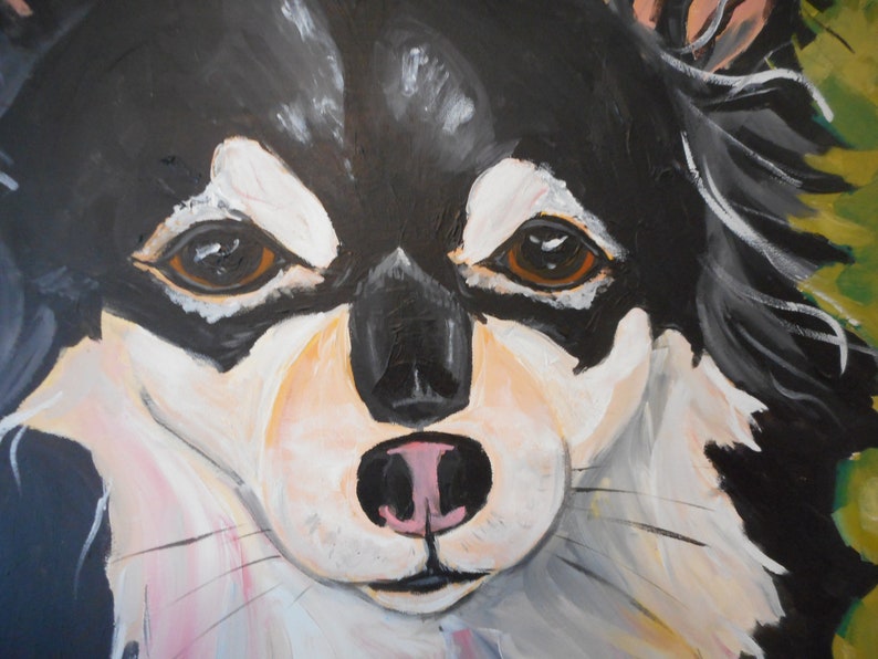 May include: A close-up painting of a black and white dog's face. The dog has brown eyes, a black nose, and a pink tongue. The painting is done in a realistic style.
